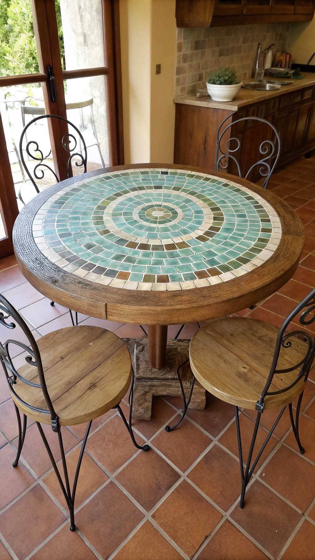 32. Rustic Round Table with a Mosaic Tile Top