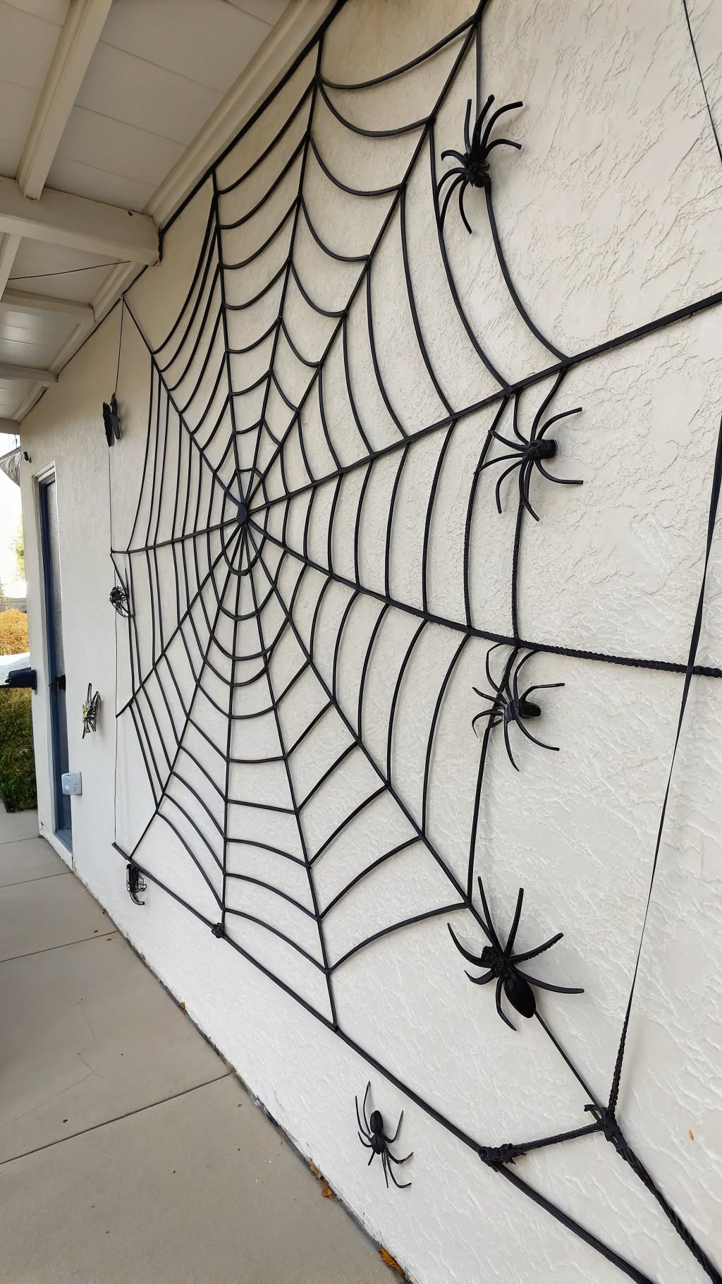 12. DIY Spider Web Wall Art