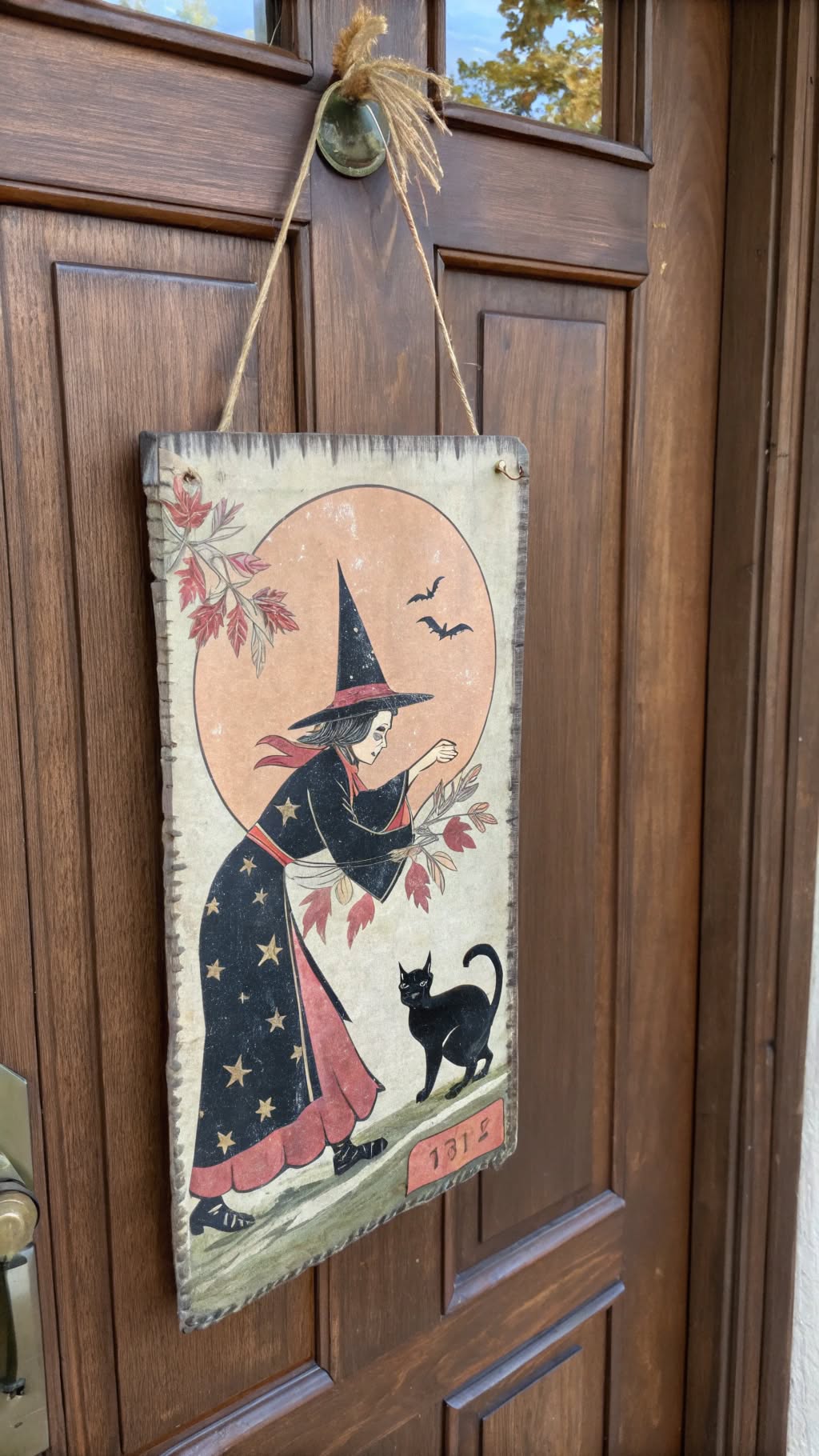 20. Vintage Halloween Postcard-Inspired Hanger