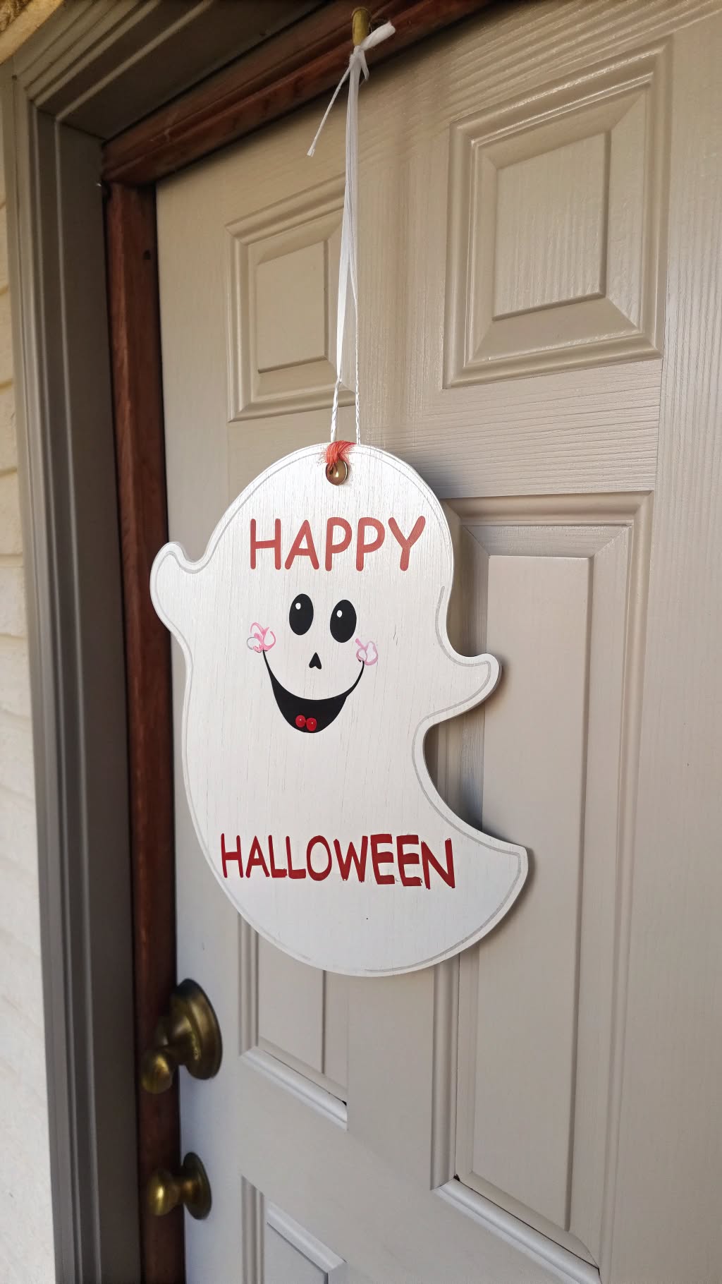 6. Ghostly Greeting Hanger