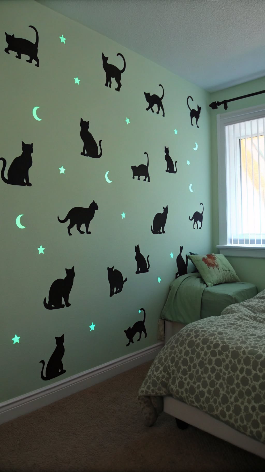 6. Glowing Black Cat Silhouettes